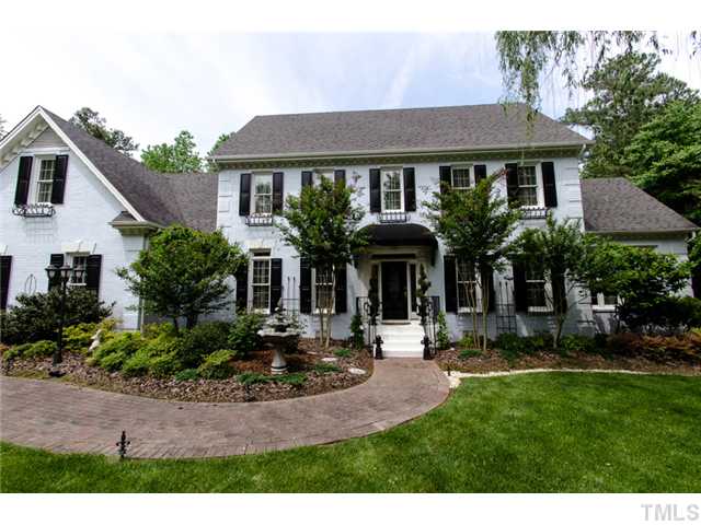 105 Carpathian Way Raleigh, NC 27615 - Photo 2 of 25 a front view of a house with a yard and a porch