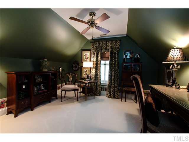 105 Carpathian Way Raleigh, NC 27615 - Photo 22 of 25 a dining room with furniture and window