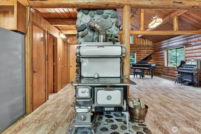 a view of a dinning room with wooden floor