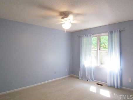 1505 Edgeside Court Raleigh, NC 27609 - Photo 8 of 10 2 add'l BRs have neutral carpet, ceiling fans & lg closets and they share a spacious Bath w/ceramic tile flr. Other