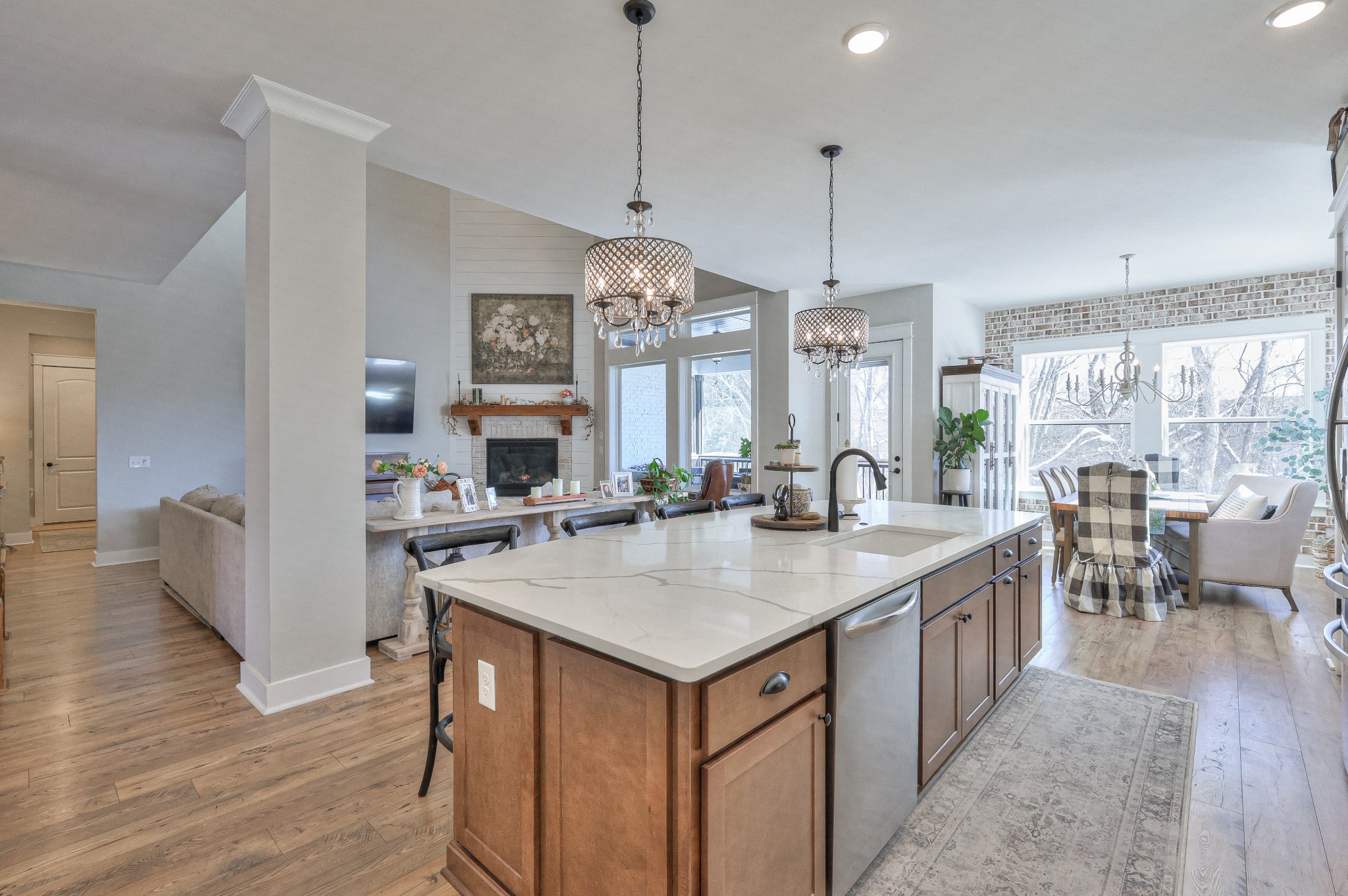 7760 Thayer Road Nolensville, TN 37135 - Photo 13 of 58 a open kitchen with sink stove and wooden floor