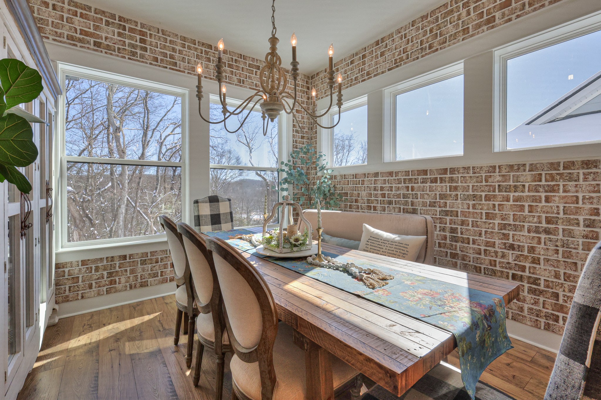 7760 Thayer Road Nolensville, TN 37135 - Photo 15 of 58 a view of a dining room with furniture wooden floor and a chandelier
