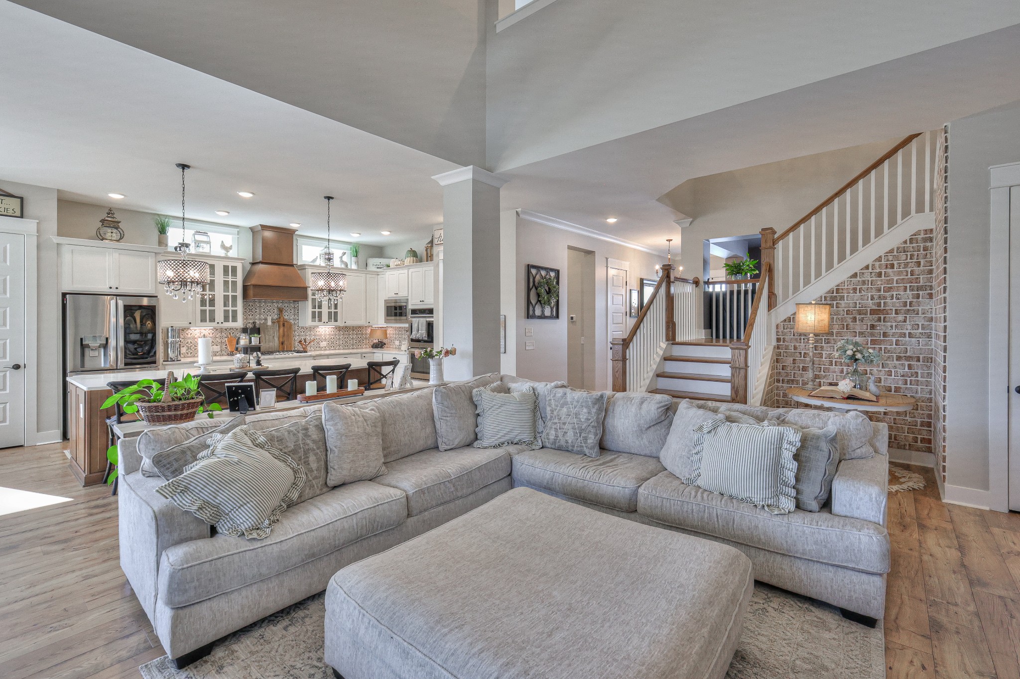7760 Thayer Road Nolensville, TN 37135 - Photo 20 of 58 a view of a living room kitchen and a couch