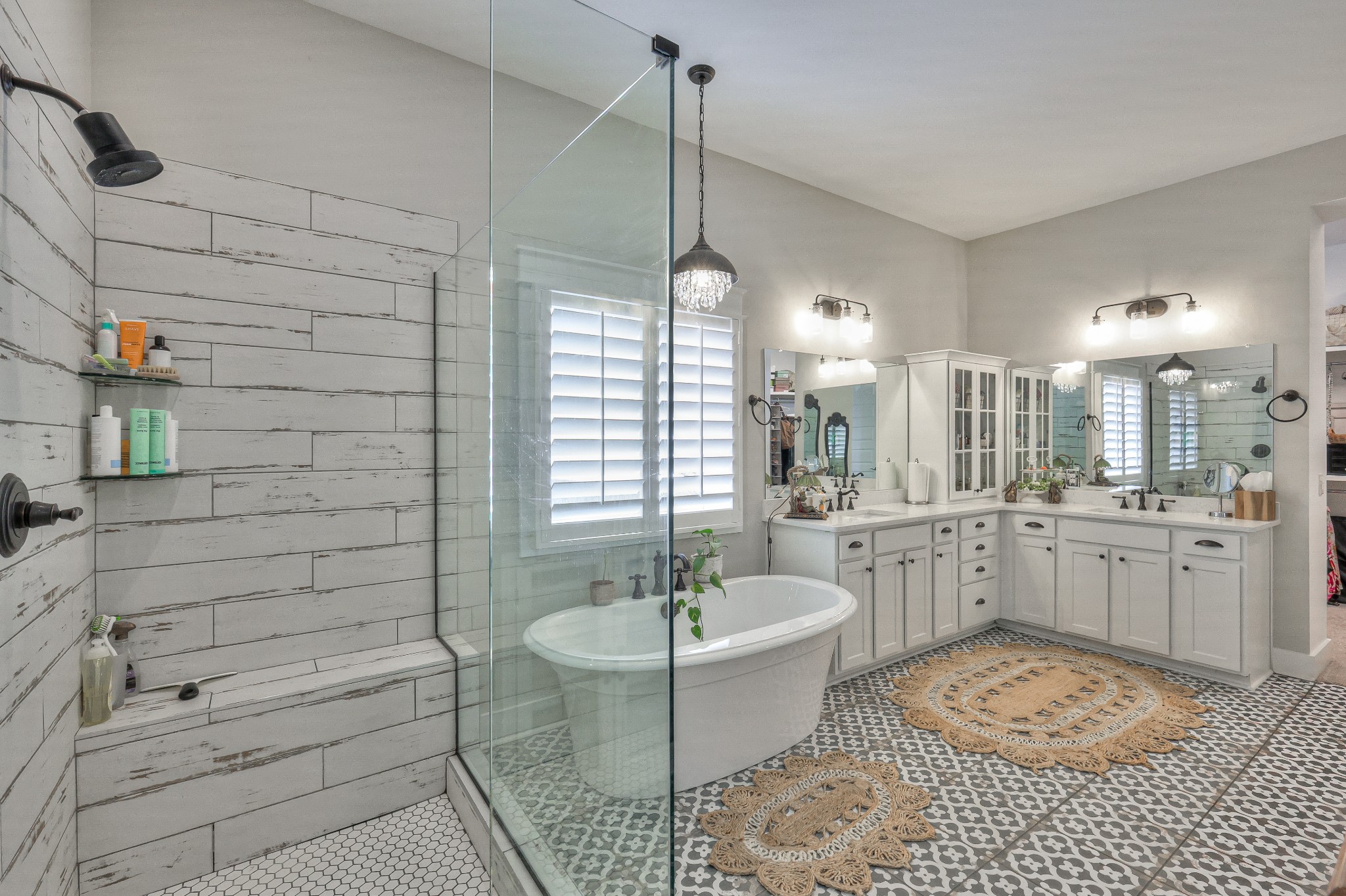 7760 Thayer Road Nolensville, TN 37135 - Photo 32 of 58 a bathroom with a granite countertop sink a toilet a mirror and shower