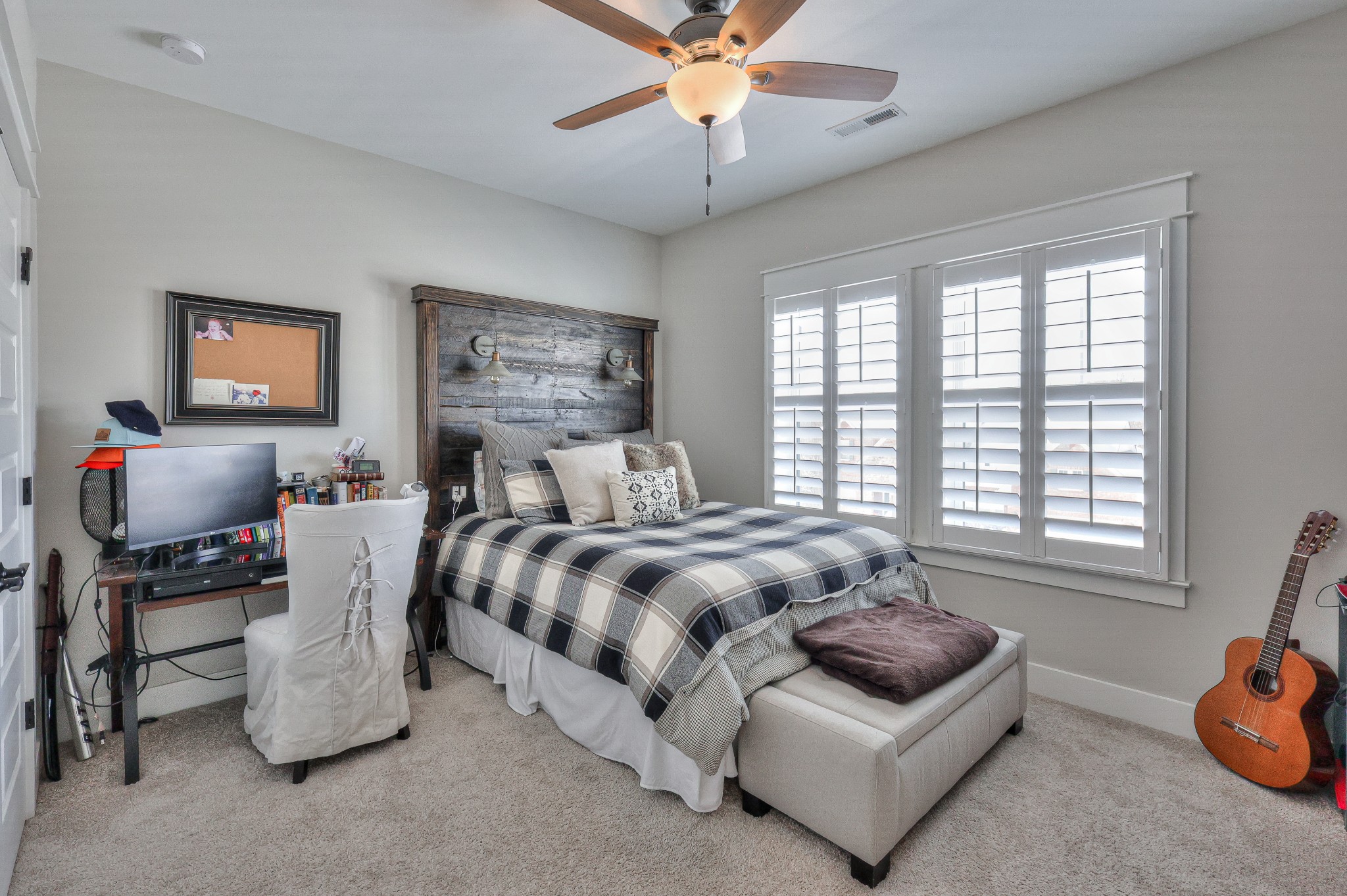 7760 Thayer Road Nolensville, TN 37135 - Photo 48 of 58 a spacious bedroom with a bed and a chandelier