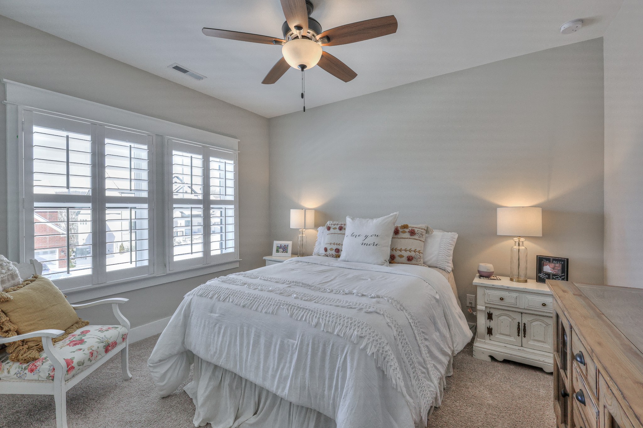 7760 Thayer Road Nolensville, TN 37135 - Photo 49 of 58 a bedroom with a bed and a chandelier