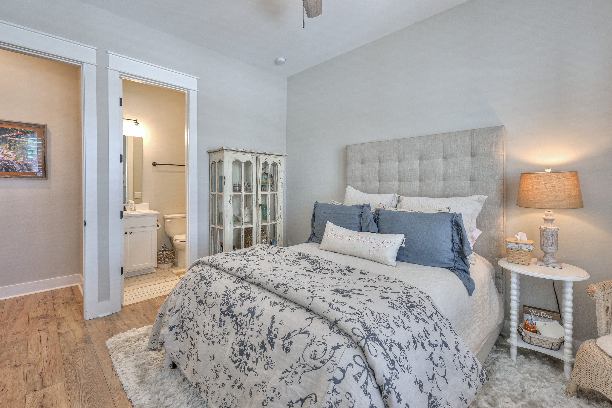 7760 Thayer Road Nolensville, TN 37135 - Photo 6 of 58 a bedroom with a bed and a lamp