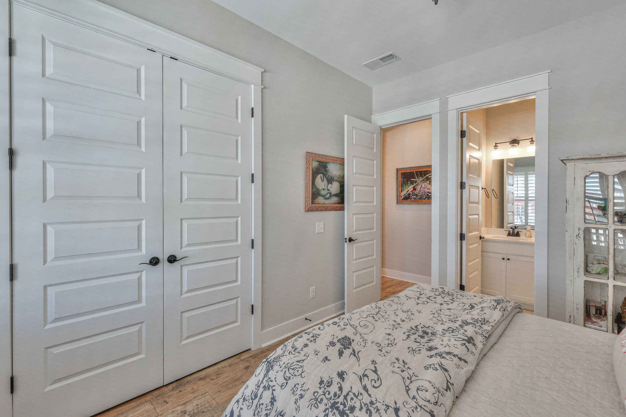 7760 Thayer Road Nolensville, TN 37135 - Photo 7 of 58 a bedroom with a bed and wooden floor