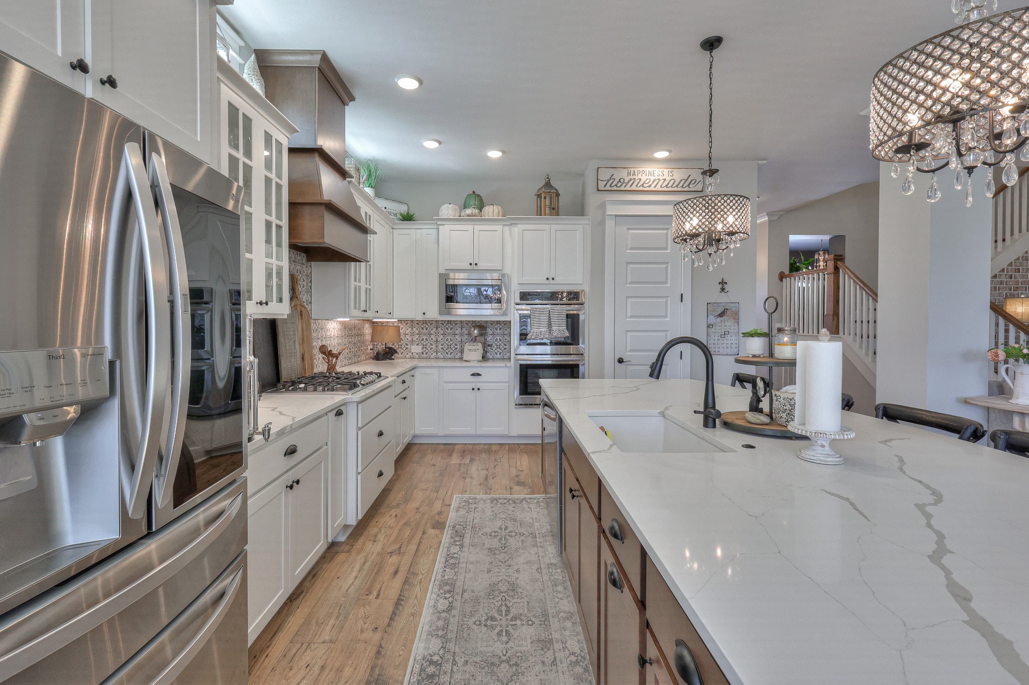 7760 Thayer Road Nolensville, TN 37135 - Photo 8 of 58 a large kitchen with stainless steel appliances lots of counter top space