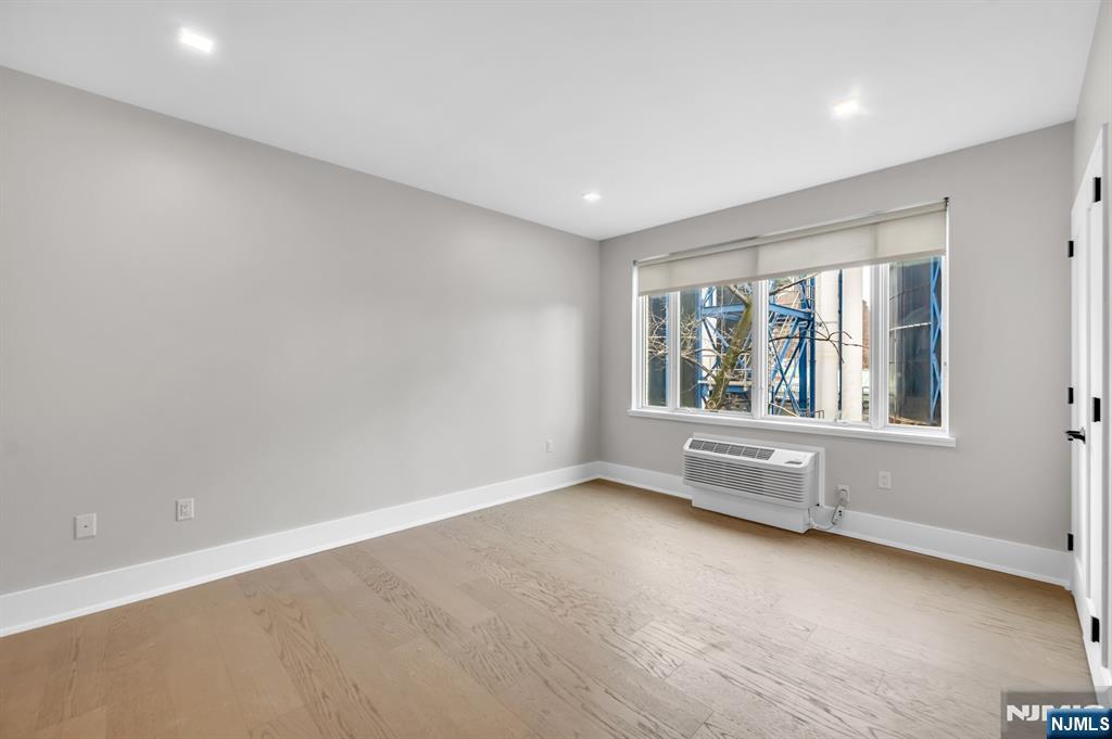 7101 River Road, Unit 202B North Bergen, NJ 07047 - Photo 14 of 17 a view of an empty room with a window