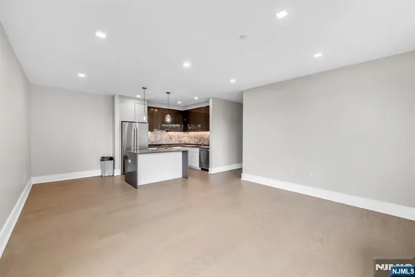 a view of a kitchen with a sink