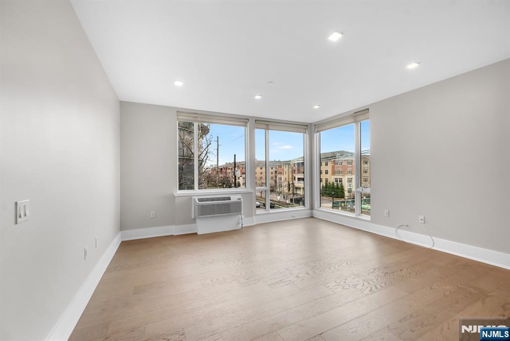 7101 River Road, Unit 202B North Bergen, NJ 07047 - Photo 6 of 17 a view of an empty room with a window