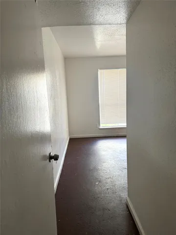 a view of a room with a window