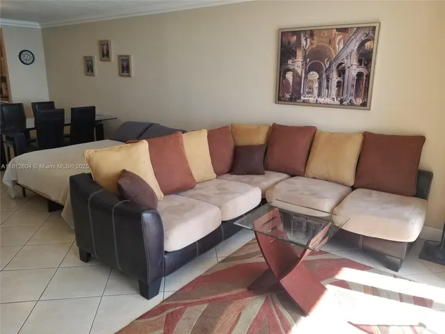 a living room with a couch and a coffee table