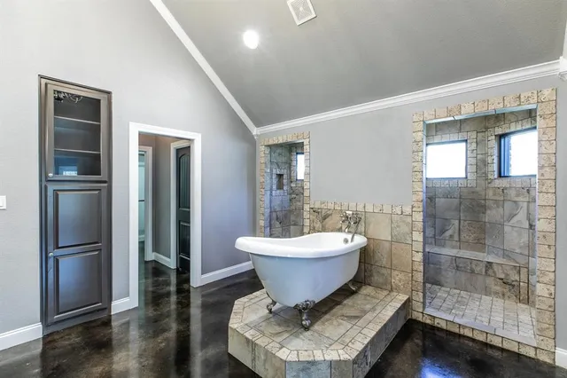 a room with a sink and wooden floor