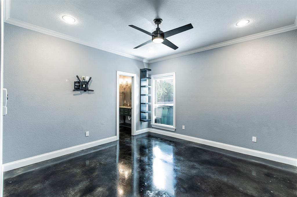 20 Independence Trail Waco, TX 76708 - Photo 13 of 40 an empty room with wooden floor and windows