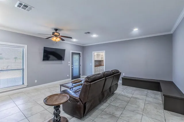 a kitchen with a sink and a refrigerator