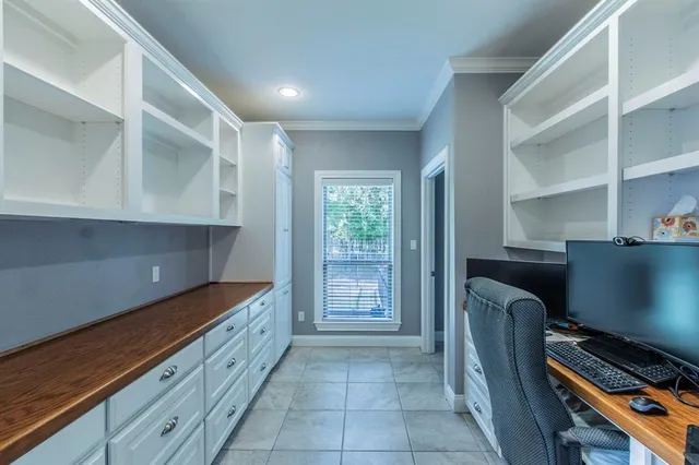a kitchen with granite countertop a stove and a refrigerator