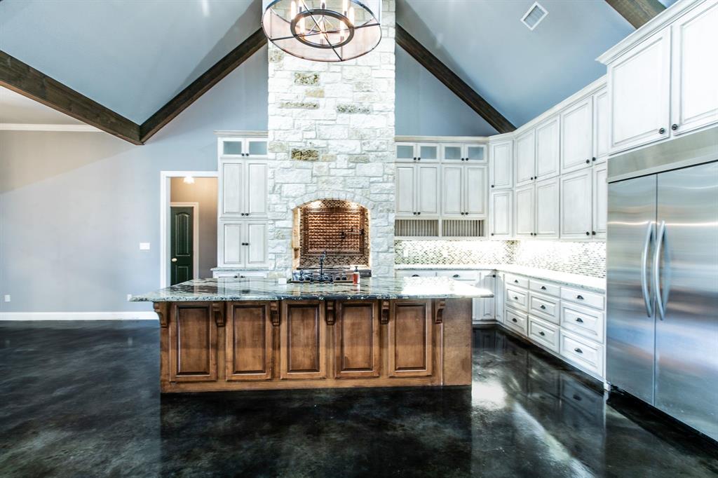 20 Independence Trail Waco, TX 76708 - Photo 4 of 40 a kitchen with cabinets a sink and appliances