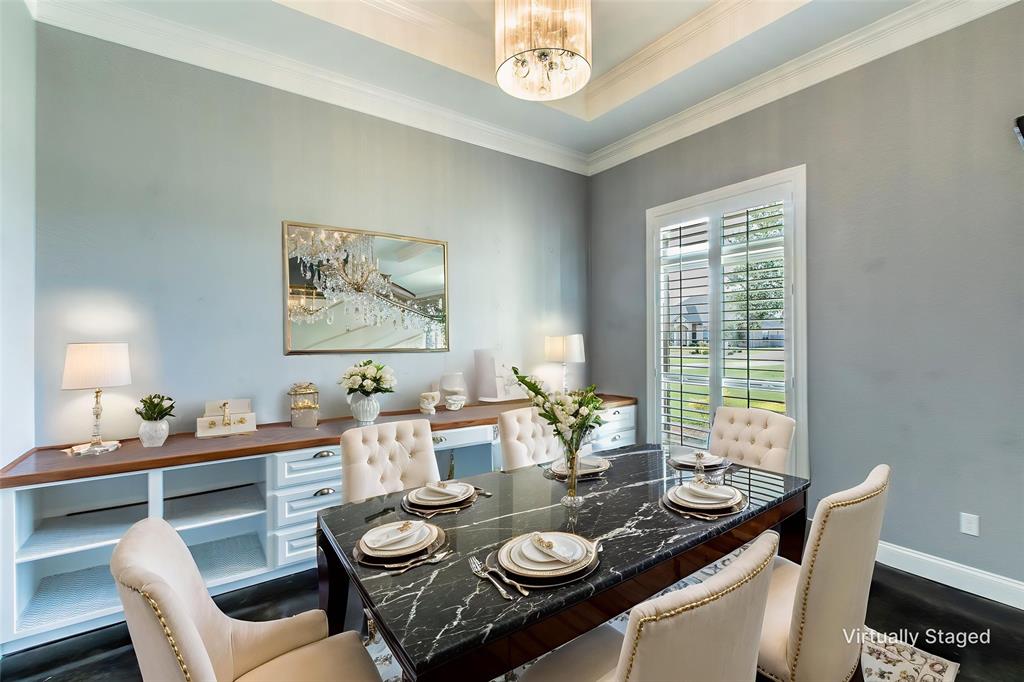 20 Independence Trail Waco, TX 76708 - Photo 7 of 40 a view of a dining room with furniture a chandelier and wooden floor