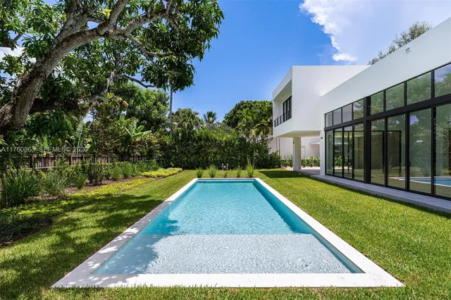 a view of a building with a swimming pool