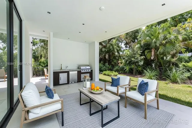 a view of backyard with swimming pool