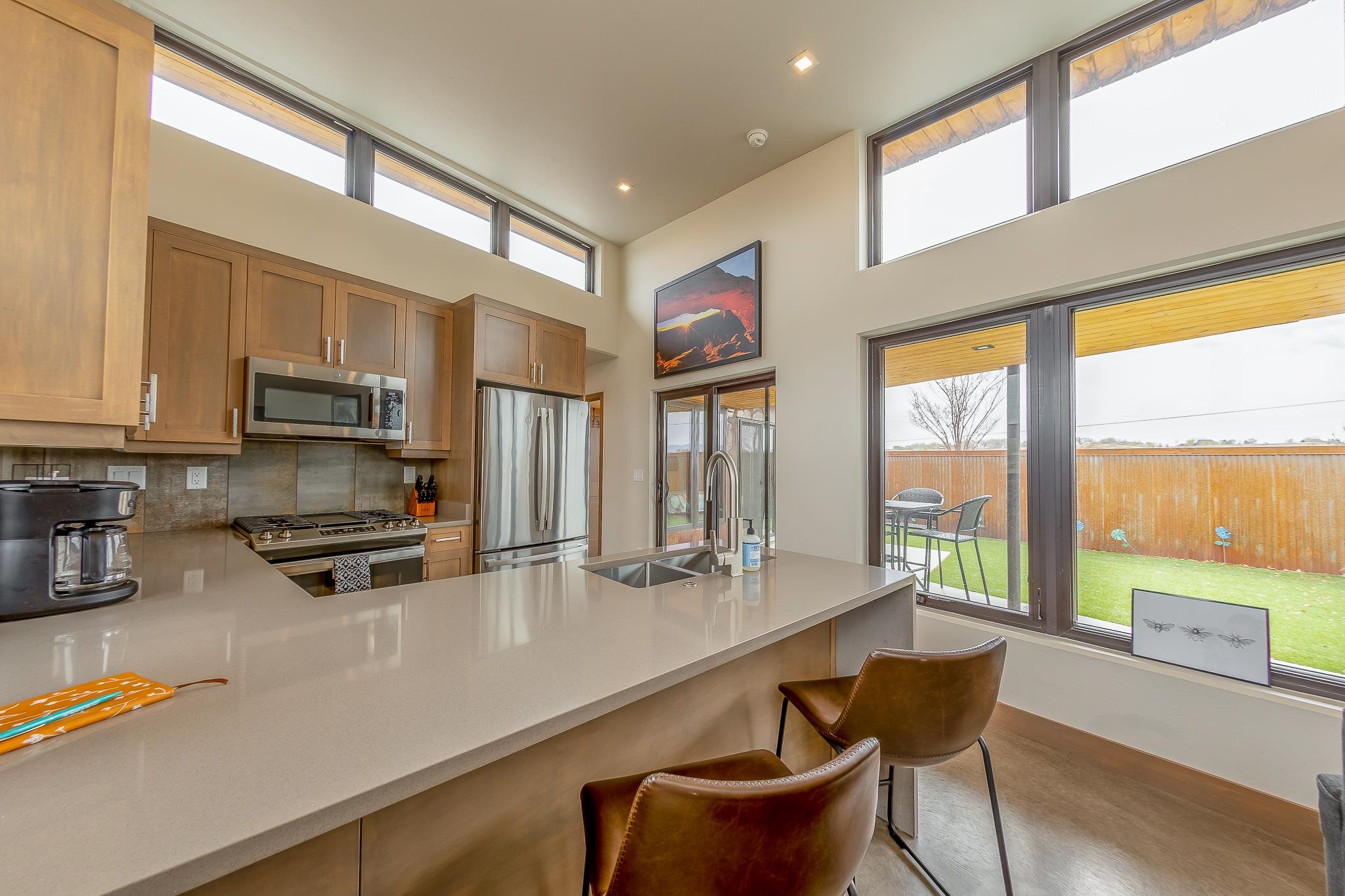 450 Red River Loop Clifton, CO 81520 - Photo 5 of 11 a kitchen with stainless steel appliances a stove a sink and a microwave