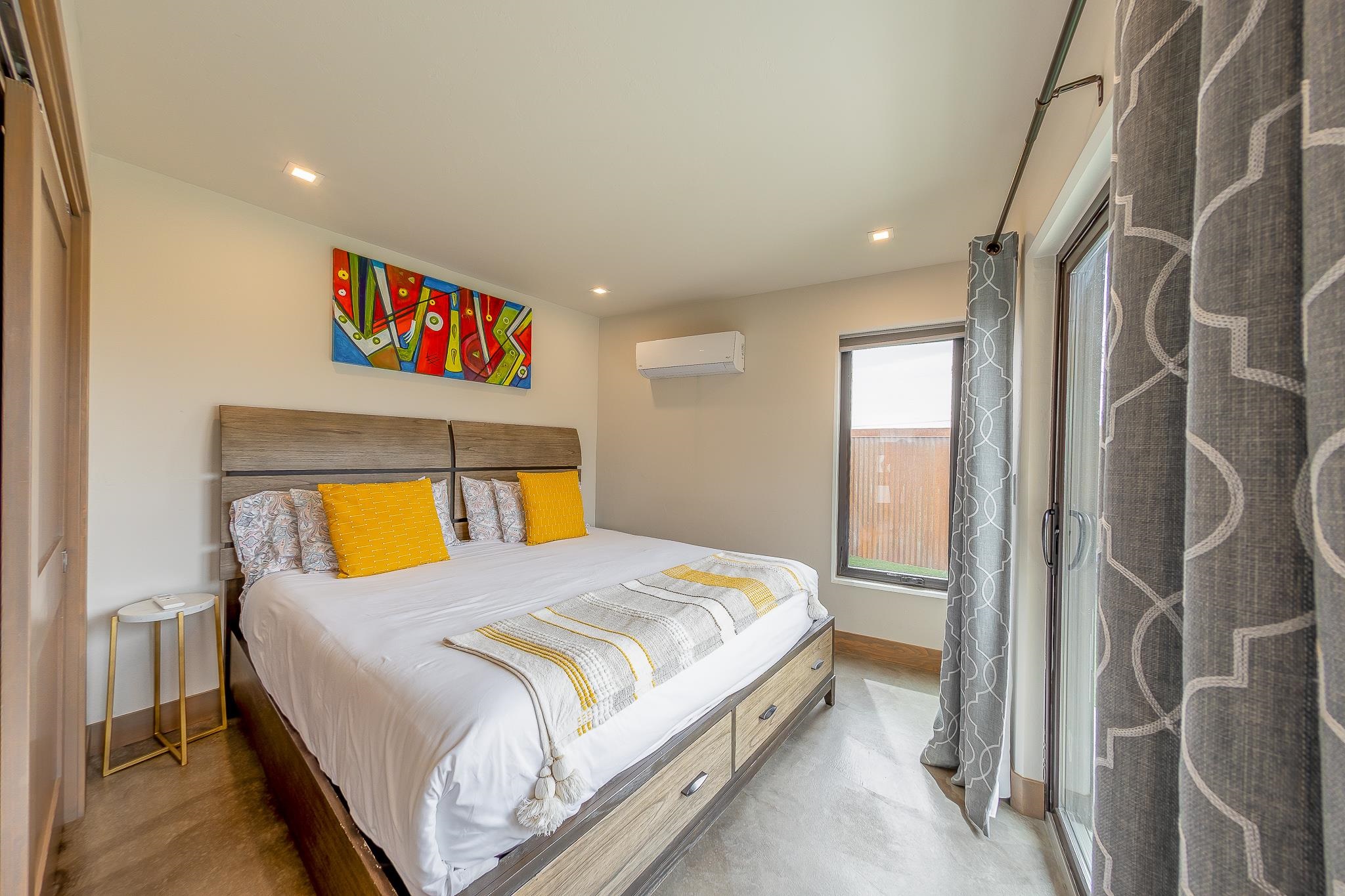 450 Red River Loop Clifton, CO 81520 - Photo 8 of 11 a bedroom with a bed and a painting on the wall