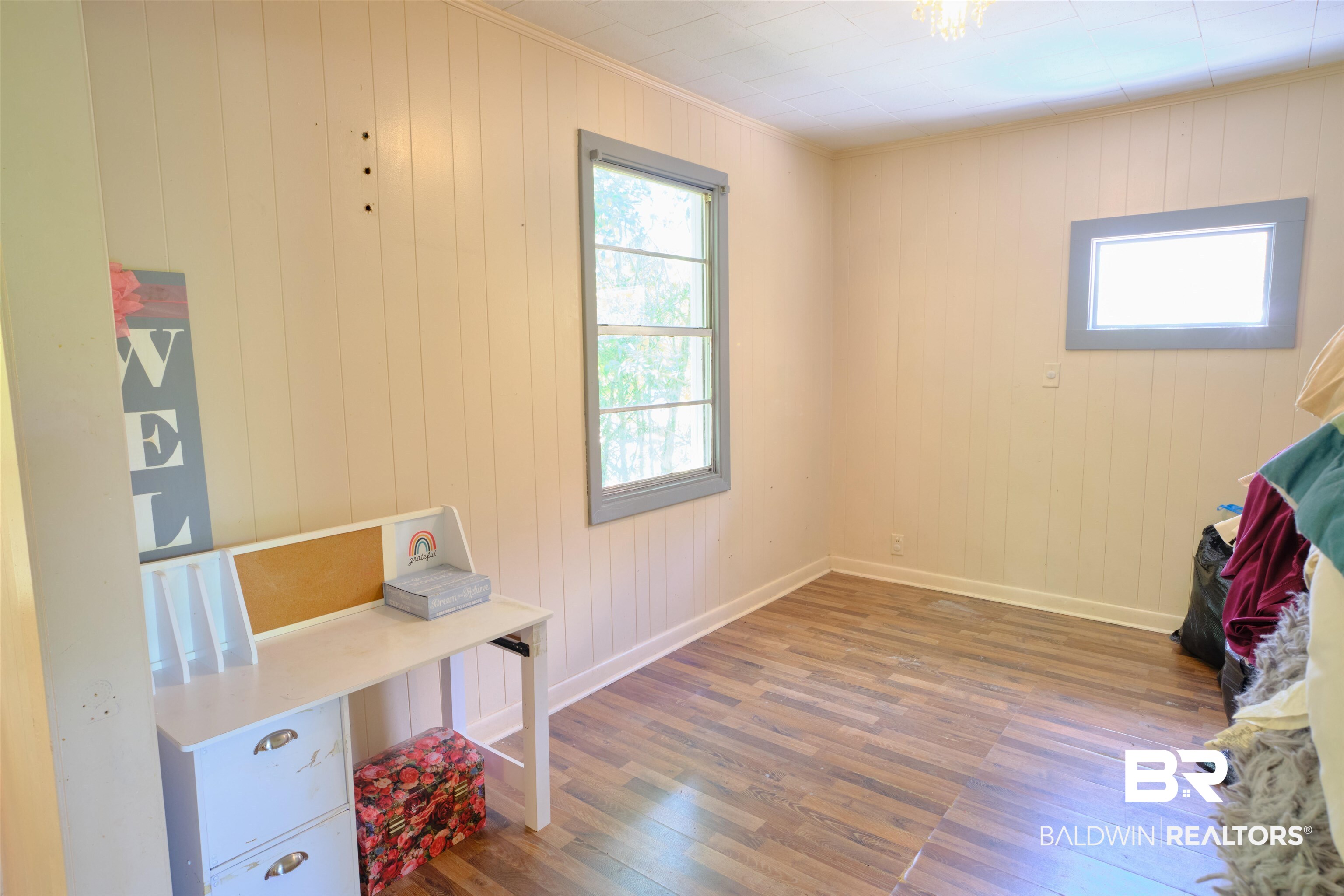 101 West Horner Street Atmore, AL 36502 - Photo 13 of 38 Interior space featuring crown molding and hardwood / wood-style flooring