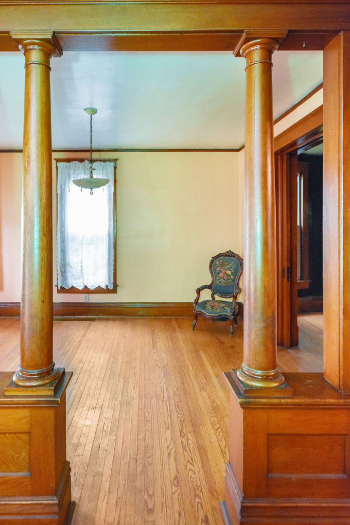 413 North 3rd Street Dunlap, IL 61525 - Photo 12 of 41 a living room with a bed furniture and a window