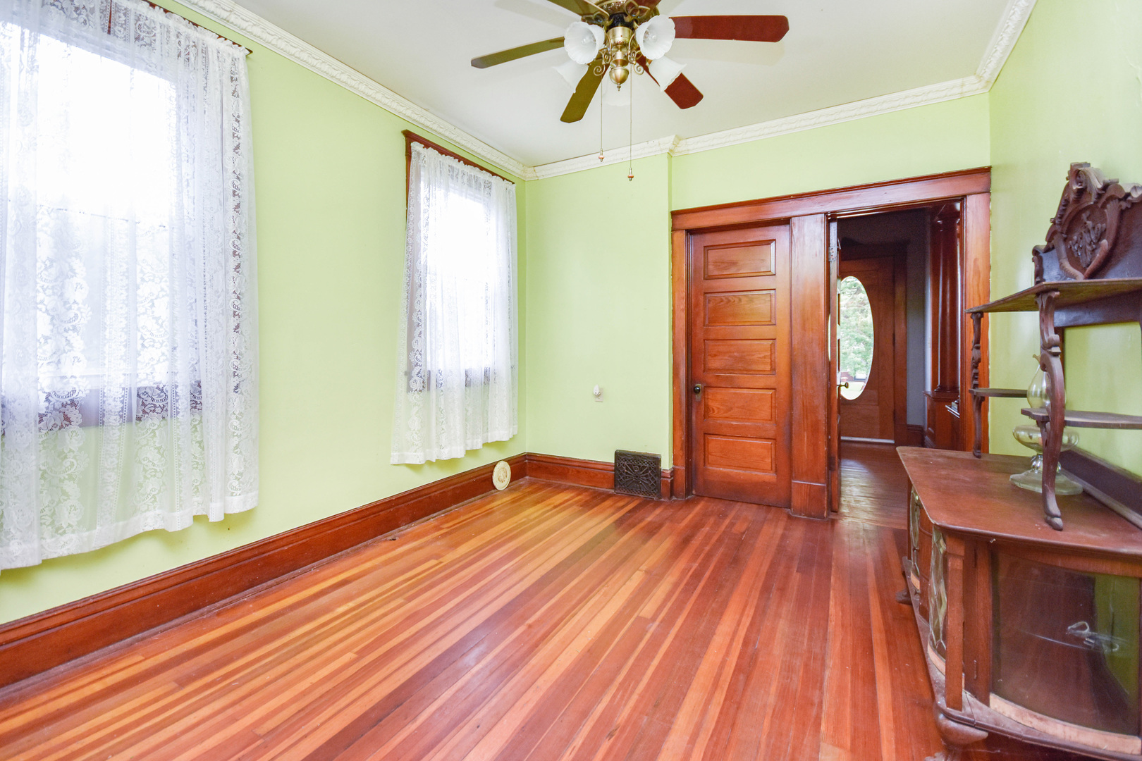 413 North 3rd Street Dunlap, IL 61525 - Photo 13 of 41 a view of a room with wooden floor and staircase