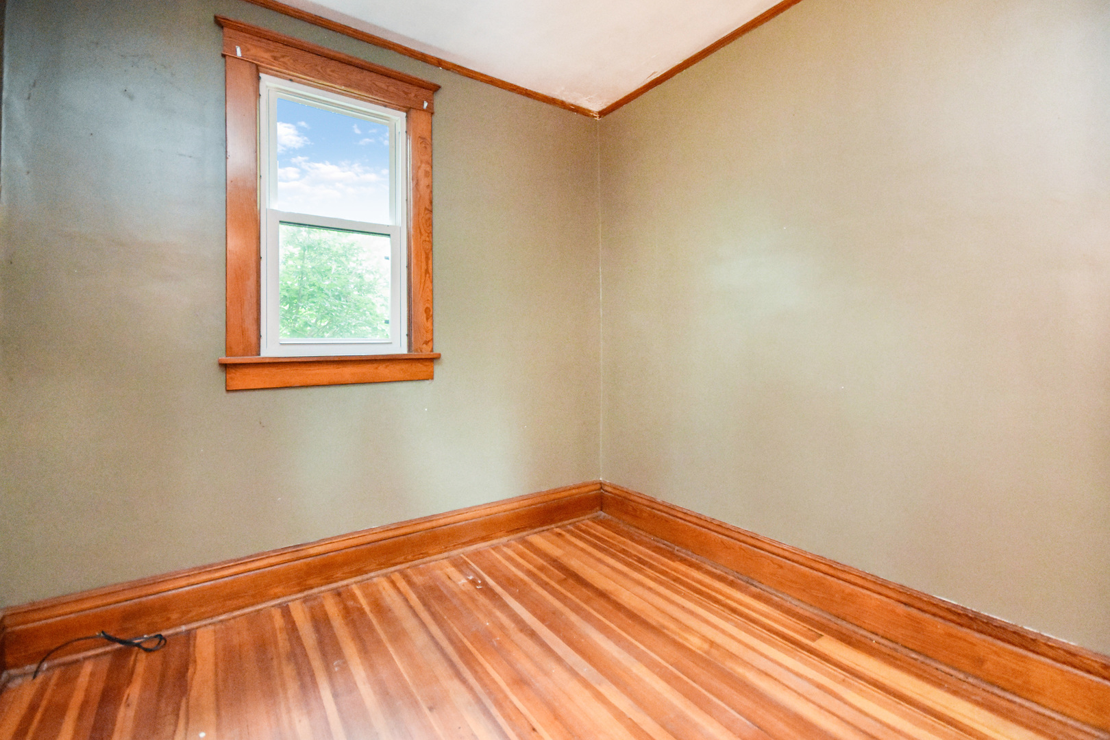 413 North 3rd Street Dunlap, IL 61525 - Photo 16 of 41 a view of a room with wooden floor and a window