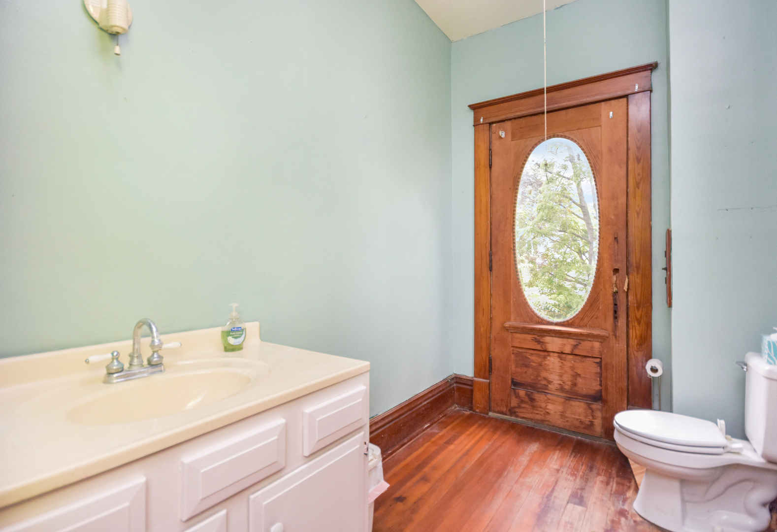 413 North 3rd Street Dunlap, IL 61525 - Photo 19 of 41 a bathroom with a toilet a sink and mirror