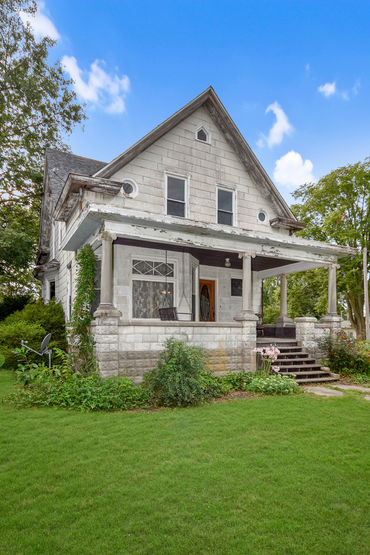 413 North 3rd Street Dunlap, IL 61525 - Photo 2 of 41 a front view of house with yard and green space