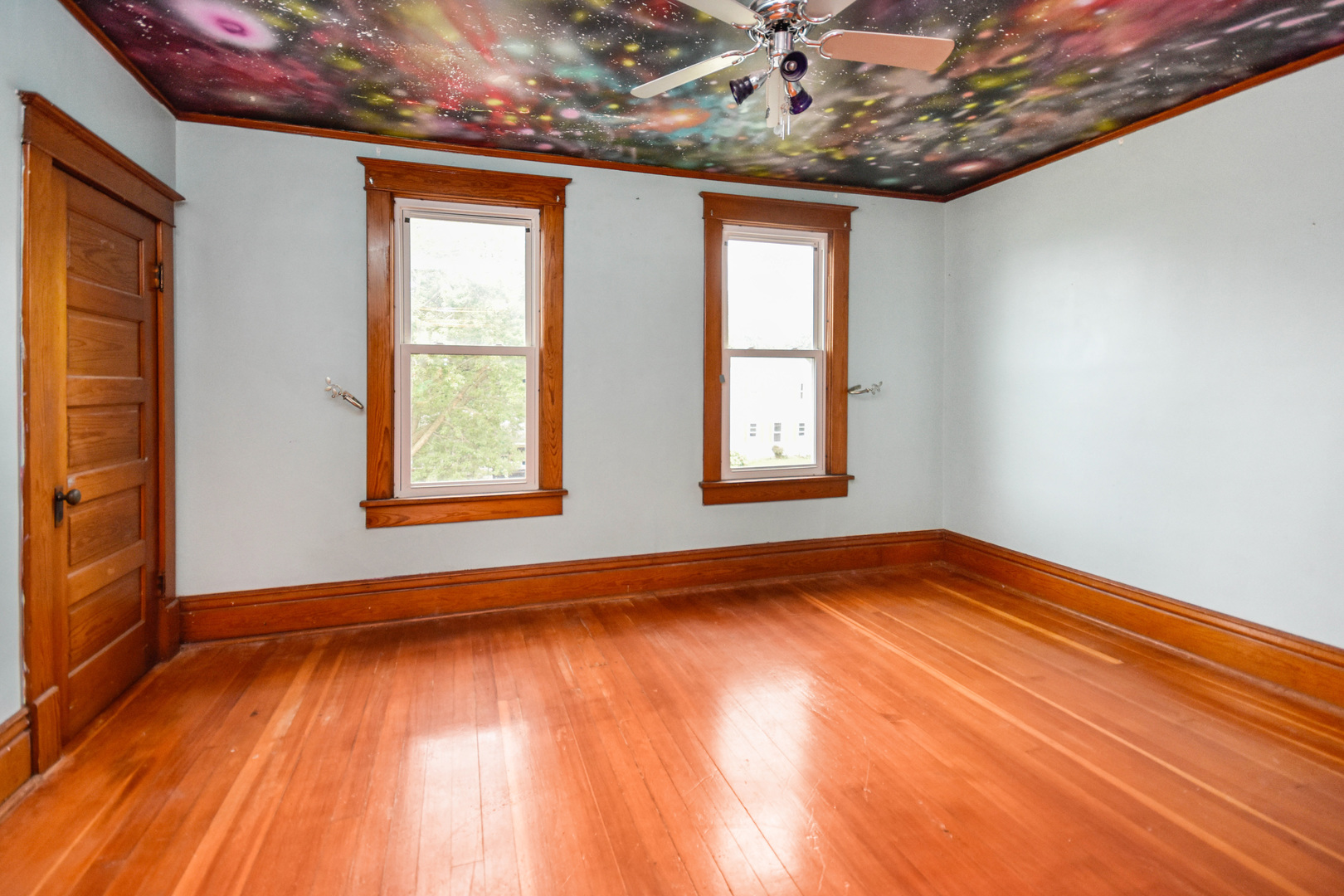 413 North 3rd Street Dunlap, IL 61525 - Photo 26 of 41 a view of empty room with wooden floor and fan