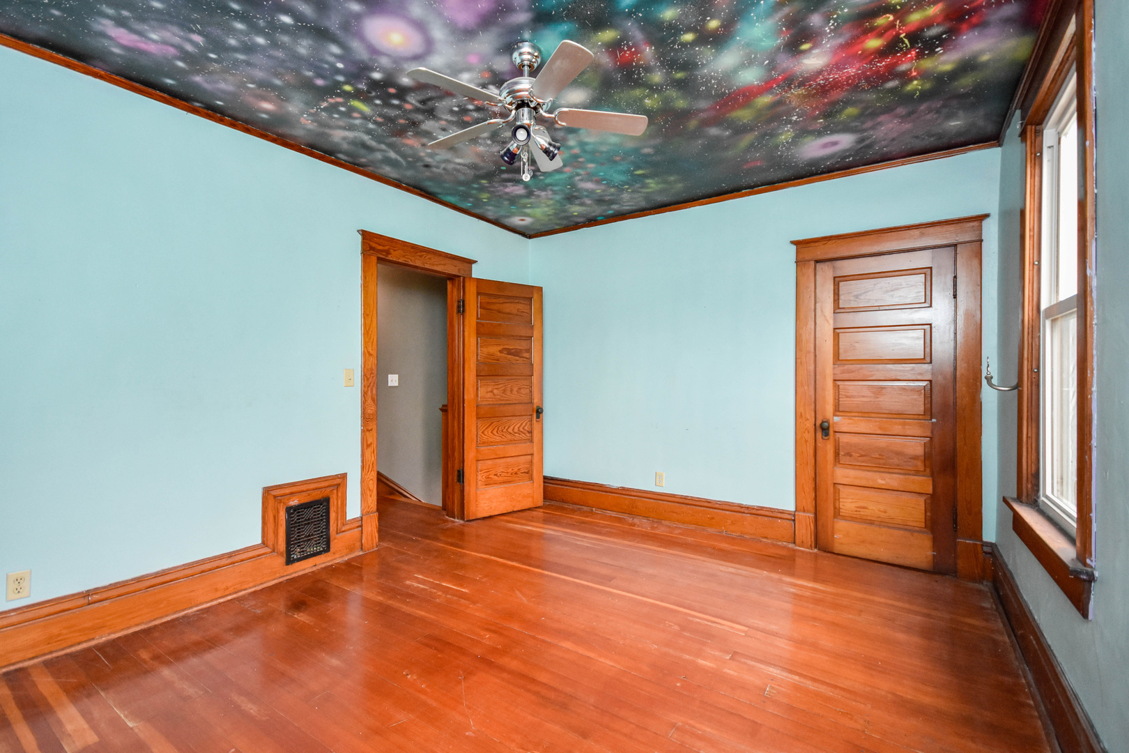 413 North 3rd Street Dunlap, IL 61525 - Photo 28 of 41 a view of an empty room with wooden floor and a window