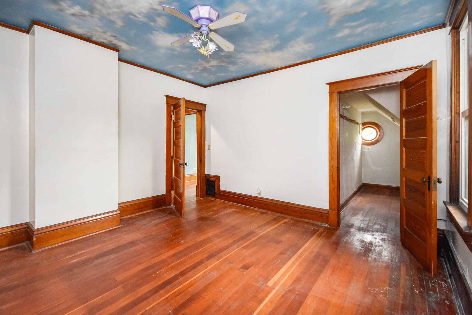 413 North 3rd Street Dunlap, IL 61525 - Photo 30 of 41 a view of an empty room with wooden floor and a window