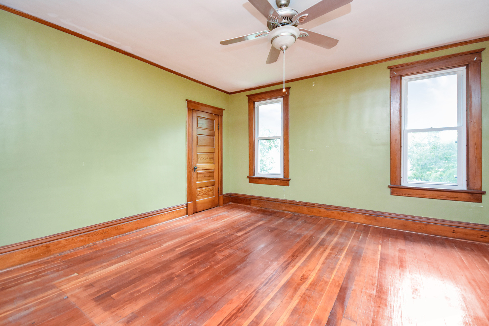 413 North 3rd Street Dunlap, IL 61525 - Photo 32 of 41 a view of an empty room with window and wooden floor