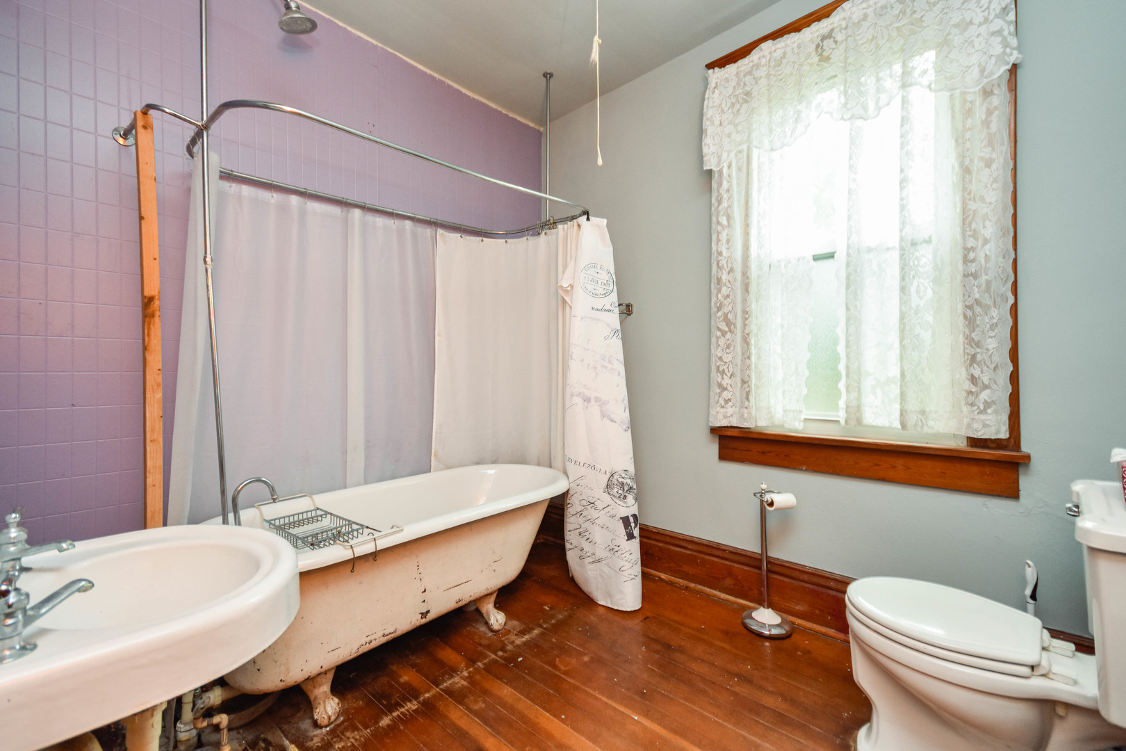 413 North 3rd Street Dunlap, IL 61525 - Photo 35 of 41 a bathroom with a granite countertop sink a toilet a mirror and shower