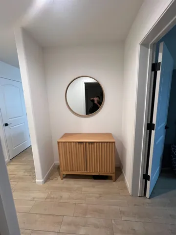 wooden floor with staircase