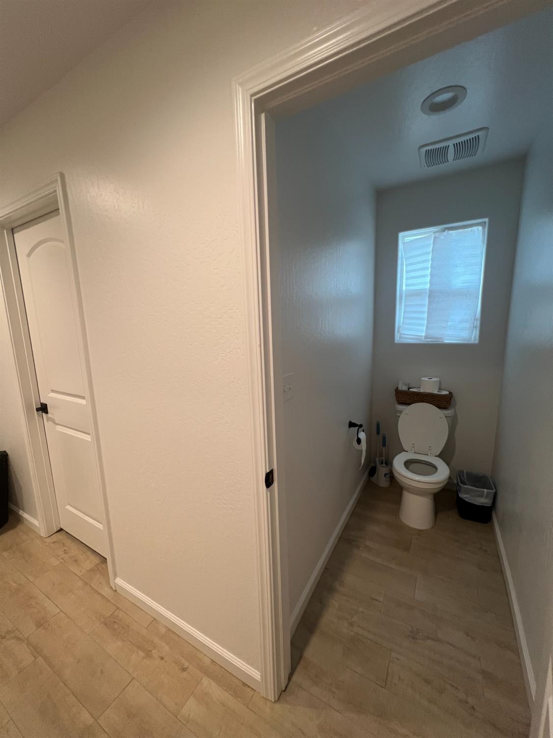 788 Apple Street Dinuba, CA 93618 - Photo 32 of 46 a bathroom with a toilet