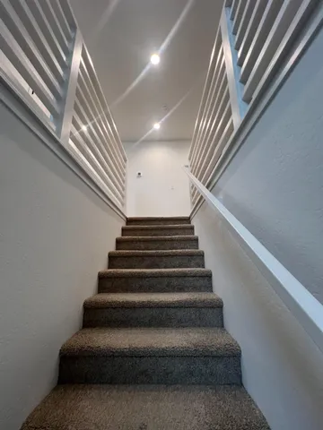 a white stove top oven sitting inside of a house