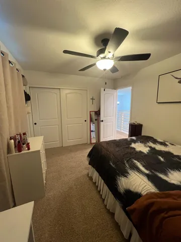 a view of a livingroom with a staircase