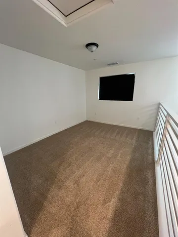 a view of a road with an ocean view