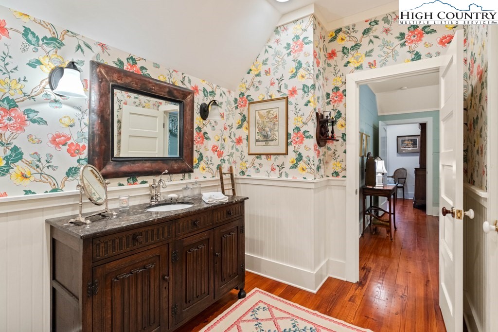 210 Farm Loop Road Banner Elk, NC 28604 - Photo 16 of 48 a bathroom with a sink and a mirror