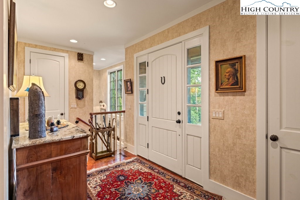 210 Farm Loop Road Banner Elk, NC 28604 - Photo 28 of 48 a very nice looking room with many windows