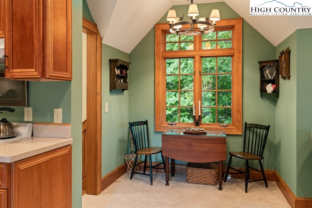 210 Farm Loop Road Banner Elk, NC 28604 - Photo 40 of 48 a dining room with furniture and window