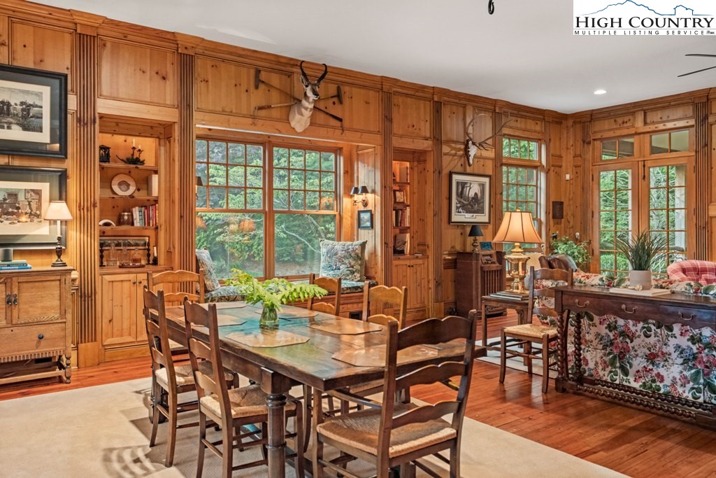 210 Farm Loop Road Banner Elk, NC 28604 - Photo 7 of 48 a view of a dining room with furniture window and outside view