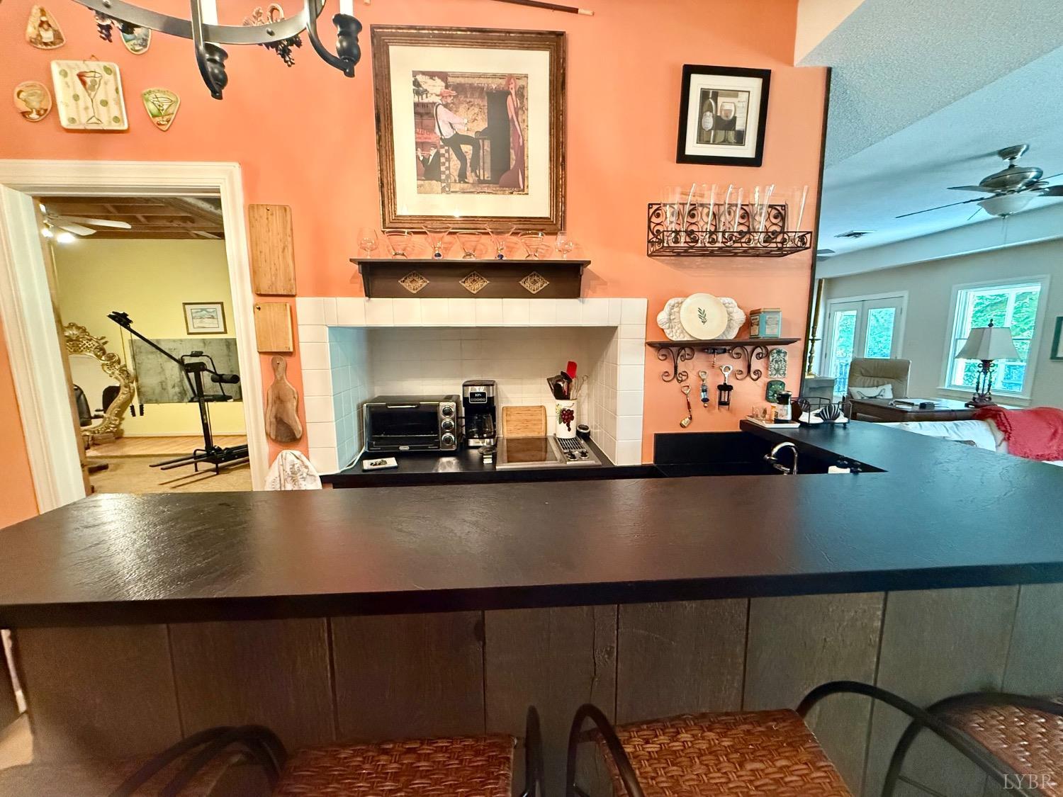 306 Quail Meadows Drive Forest, VA 24551 - Photo 37 of 57 a living room with furniture and a table