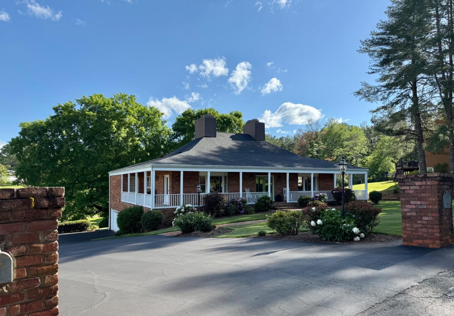 306 Quail Meadows Drive Forest, VA 24551 - Photo 57 of 57 a view of a house with a yard and a garden